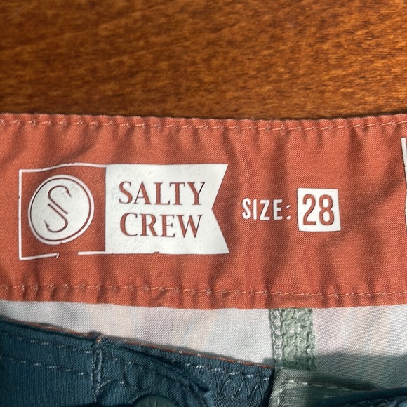 Salty Crew swim trunks size 28”, but logo on shorts is messed up. - Picture 2 of 4